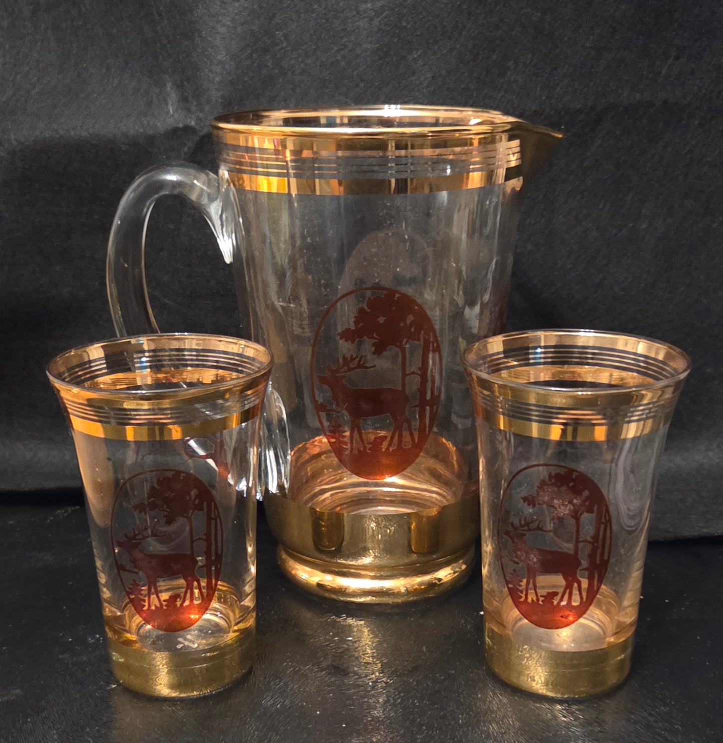 Vintage Belgian Glass Jug and two glasses with Gold Luster and Stag and Deers Scenes